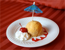 plated fried ice cream with umbrella